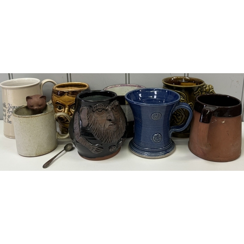 141 - Collection of vintage mugs, together with a mustard spoon. Makers include Royal Doulton, Royal Barum... 