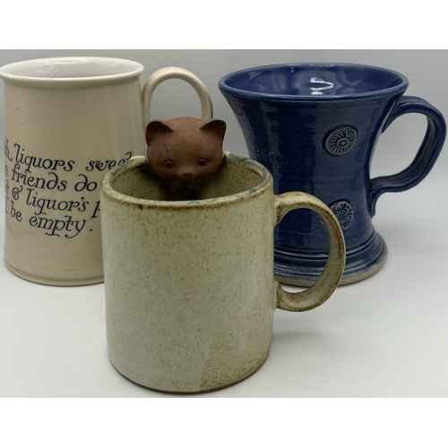 141 - Collection of vintage mugs, together with a mustard spoon. Makers include Royal Doulton, Royal Barum... 