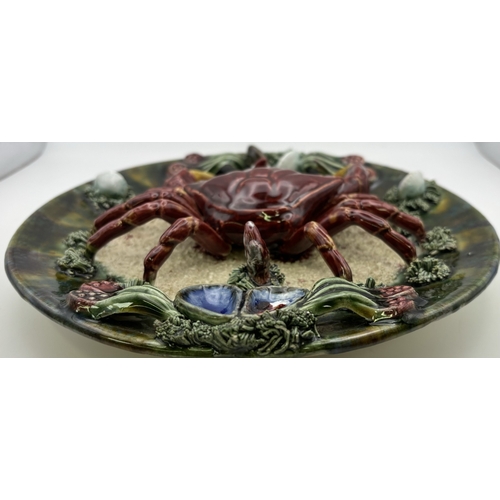 142 - Collection of 12 vintage wall decor. To include display plates, unusual crab plate & shells.