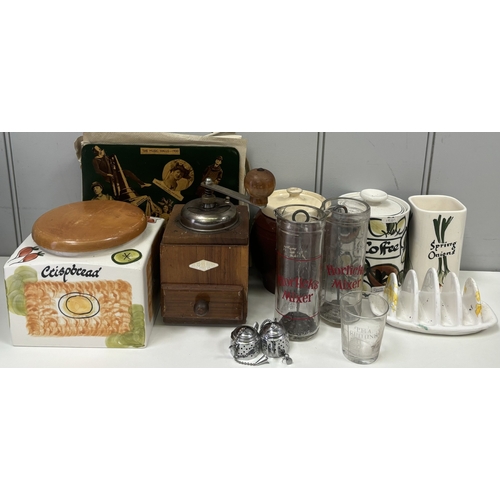 144 - Collection of vintage tableware. To include coffee grinder, branded Horlicks mixers, coaster set, et... 