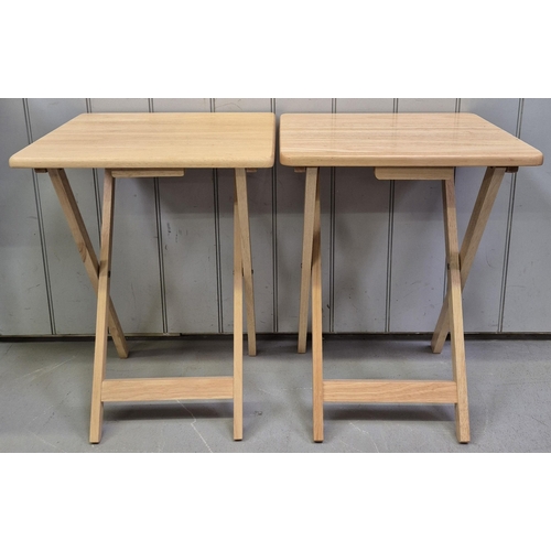 152 - Pair of contemporary folding snack tables. Dimensions(cm) H67, W49, D37.