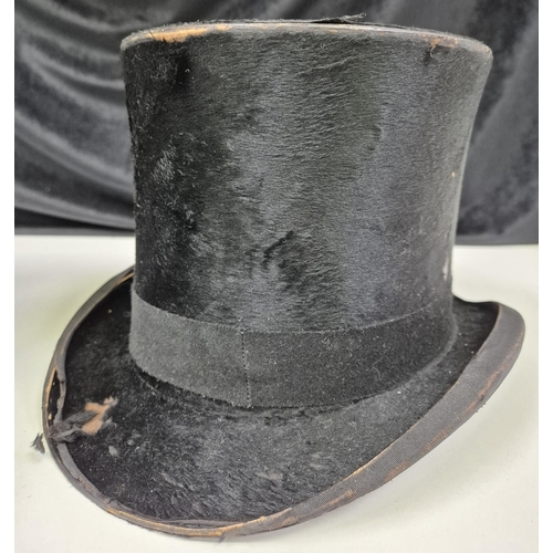 160 - Two vintage top hats; one by A Shorland. Condition A/F.