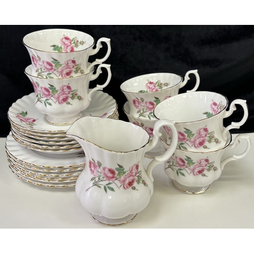 161 - Royal Albert Pink Roses part tea set. To include 6 cups, saucers & side plates, together with a milk... 