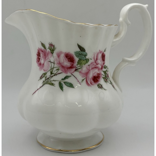 161 - Royal Albert Pink Roses part tea set. To include 6 cups, saucers & side plates, together with a milk... 