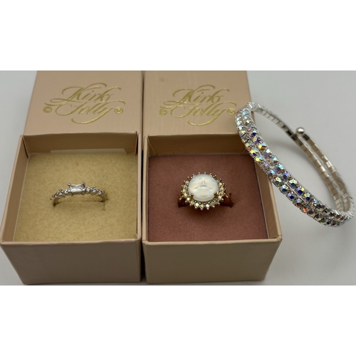 167 - Trio of jewellery by Kirks Folly. To include CZ set wrap around bracelet; white metal CZ ring , size... 