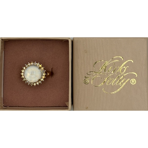 167 - Trio of jewellery by Kirks Folly. To include CZ set wrap around bracelet; white metal CZ ring , size... 