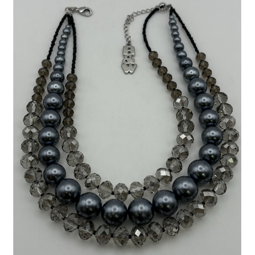 172 - Boxed Butler & Wilson three-strand necklace.