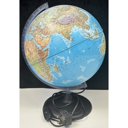 243 - Light-Up revolving globe. Dimensions(cm) H41, W32, D32. PAT test pass & functionality test indicates... 