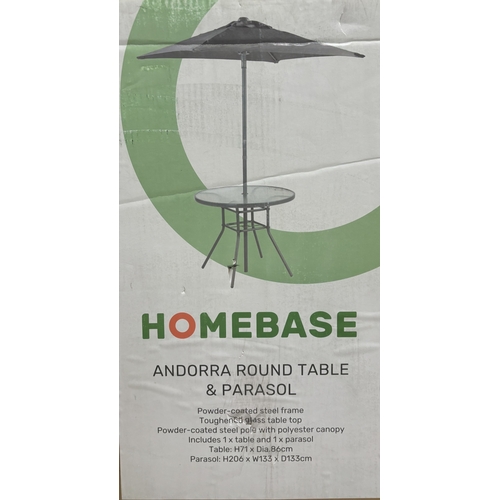 257 - Boxed/unopened Homebase Andorra outside round table & parasol set.