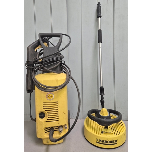 269 - Karcher pressure washer, with additional patio cleaner attachment. Model K4.99M.