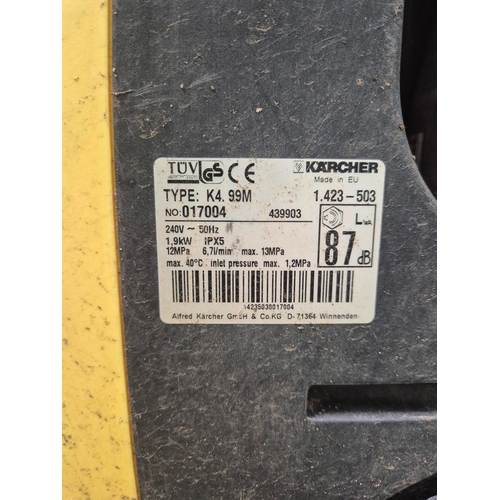 269 - Karcher pressure washer, with additional patio cleaner attachment. Model K4.99M.