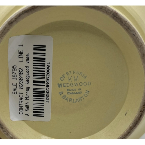 2710 - Keith Murray for Wedgwood ribbed 'football' vase, in matt straw glaze, printed marks to base, c.1930... 