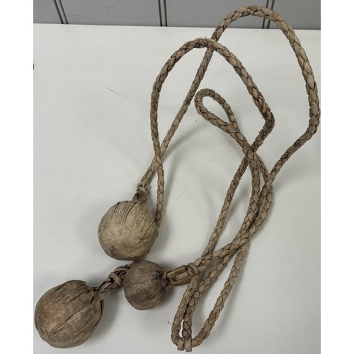 2717 - Vintage South American Bolas hunting weapon, with three cords.
