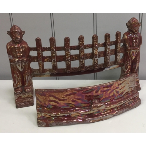 2739 - An early 20th century, cast iron/lustre fire guard. Dimensions (cm) H23, W40.