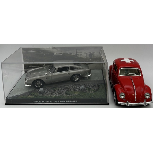 273 - Cased James Bond Goldfinger Aston Martin DB5 by G E Fabbri Ltd, together with a playworn Kinsmart 19... 