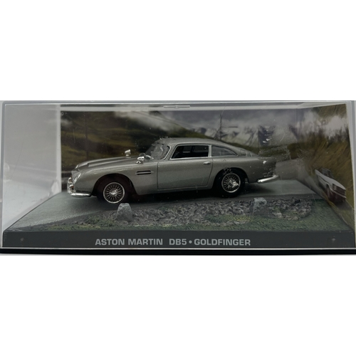 273 - Cased James Bond Goldfinger Aston Martin DB5 by G E Fabbri Ltd, together with a playworn Kinsmart 19... 