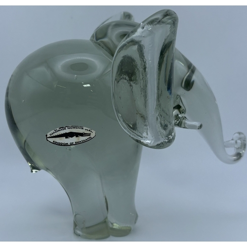 274 - Pair of handmade Ngwenya heavy glass animals. To include Elephant & Rhino. Respective heights 12.5cm... 