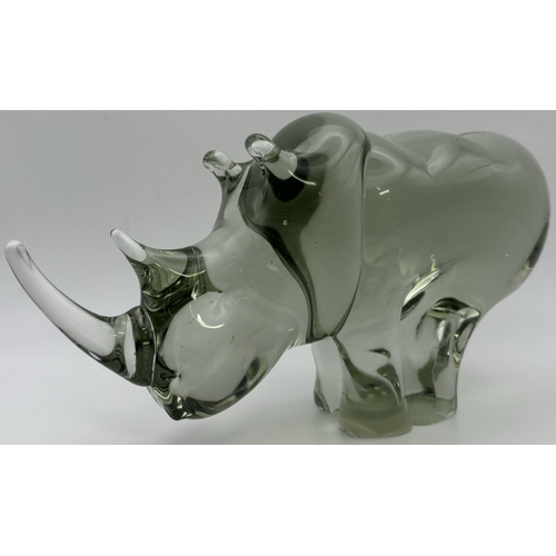 274 - Pair of handmade Ngwenya heavy glass animals. To include Elephant & Rhino. Respective heights 12.5cm... 