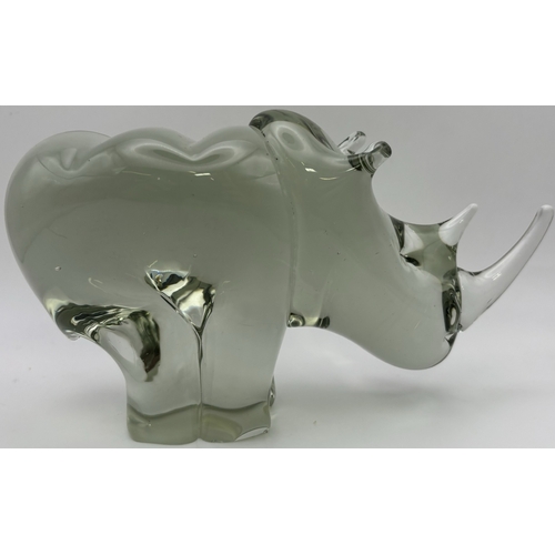 274 - Pair of handmade Ngwenya heavy glass animals. To include Elephant & Rhino. Respective heights 12.5cm... 