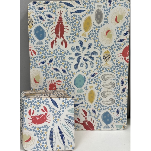 278 - Large selection of kitchenware. To include multiple coasters, tableware, thermometer, biscuit barrel... 
