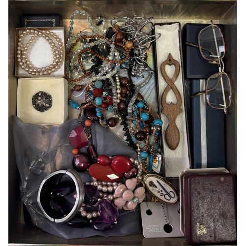 293 - Large selection of costume jewellery. To include necklaces, bracelets, love spoon, brooch, etc.