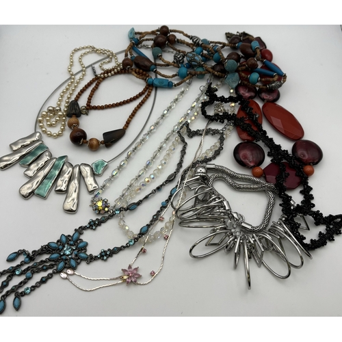 293 - Large selection of costume jewellery. To include necklaces, bracelets, love spoon, brooch, etc.