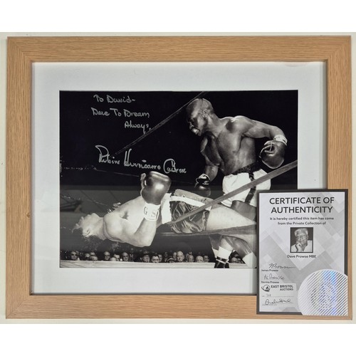 253 - Signed/Framed print of Robin Hurricane Carter (American middleweight boxer; 1937-2014), with certifi... 