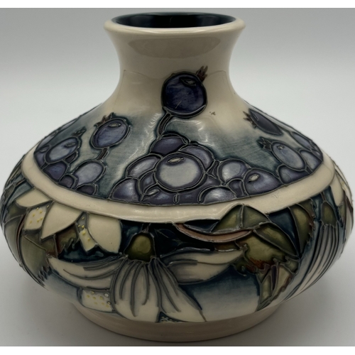 Moorcroft Juneberry pattern squat vase. Height 11.5cm.