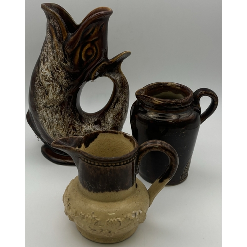 110 - Collection of 15 jugs. To include a Gluggle jug, Delft, etc.