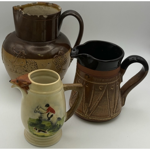 110 - Collection of 15 jugs. To include a Gluggle jug, Delft, etc.