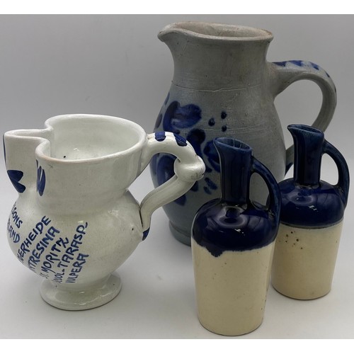 110 - Collection of 15 jugs. To include a Gluggle jug, Delft, etc.