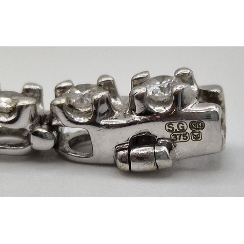 1702 - 9ct white gold tennis bracelet. Combined weight approx. 9.2g.