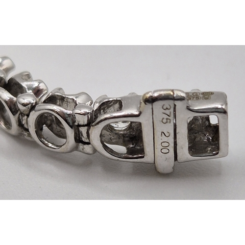 1702 - 9ct white gold tennis bracelet. Combined weight approx. 9.2g.