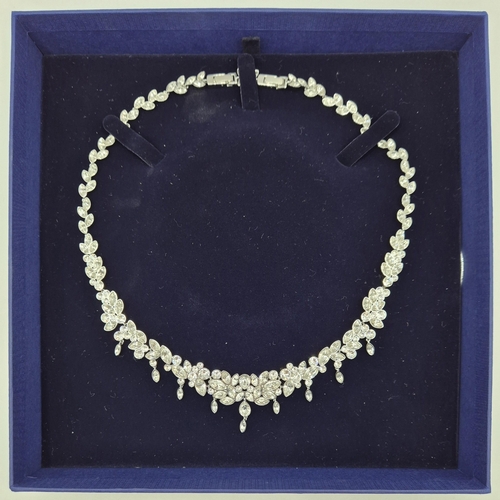 1706 - Boxed Swarovski necklace, featuring crystal leaves/floral design.