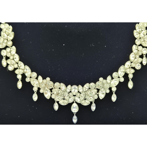 1706 - Boxed Swarovski necklace, featuring crystal leaves/floral design.