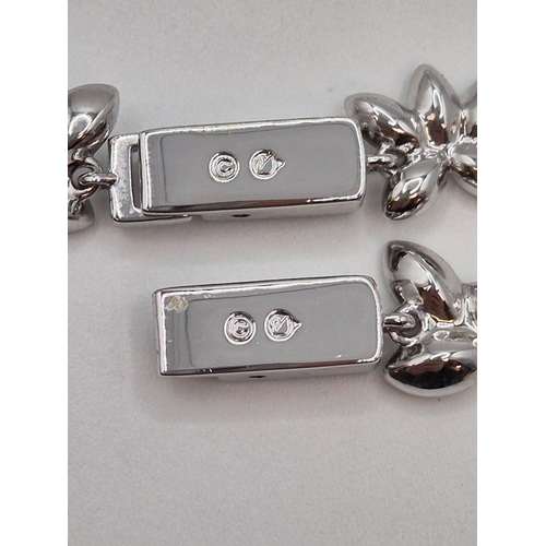 1706 - Boxed Swarovski necklace, featuring crystal leaves/floral design.