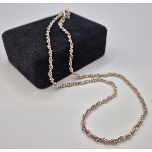 1708 - Tiffany & Co boxed silver necklace, together with another by David Christopher. Combined weight appr... 