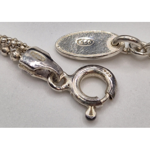 1708 - Tiffany & Co boxed silver necklace, together with another by David Christopher. Combined weight appr... 