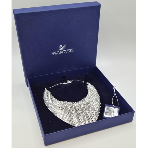 1709 - Swarovski, boxed matching waterfall necklace & earrings.