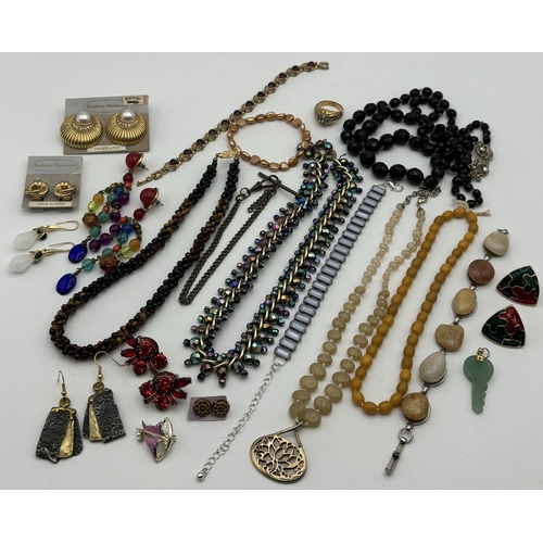 1713 - Tiered jewellery box full of costume jewellery. To include necklaces, pendants, rings, brooches, bra... 