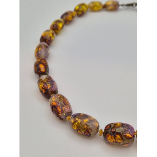 1715 - Venetian opalescent foil glass beaded necklace. Length approx. 41cm.