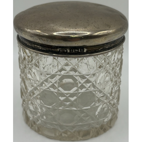 1723 - Silver-lidded vanity jar (Birmingham 1922), together with a cobalt blue poison bottle. Respective he... 