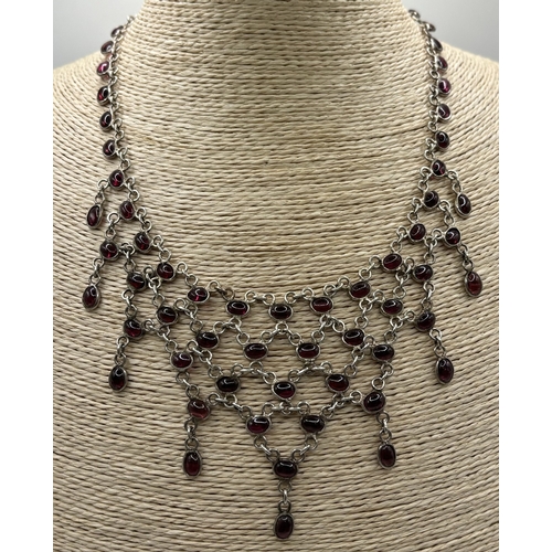 1727 - Presentation boxed silver & oval cabochon garnet necklace set.