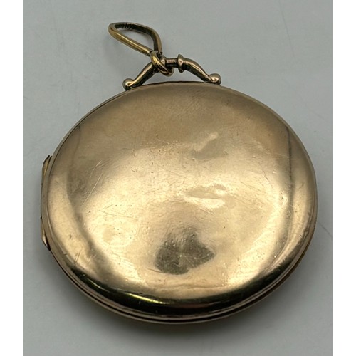 1733 - 9ct gold hallmarked round locket, with large bale. Presented in a Leslie Davey & West box. Diameter ... 