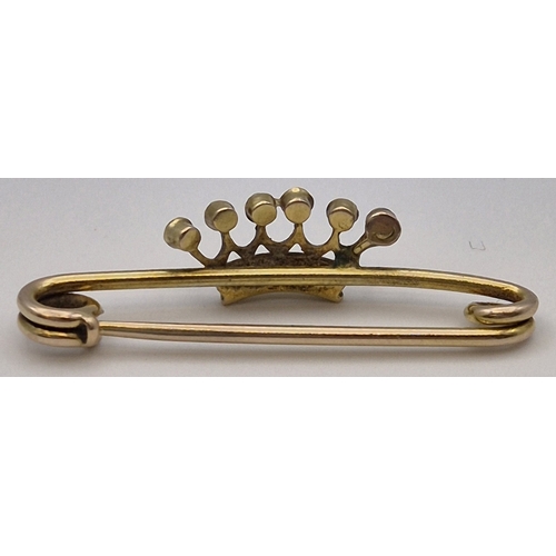 1746 - 9ct gold (acid tests as) & seed pearl crown pin brooch. Total weight approx. 2.2g.