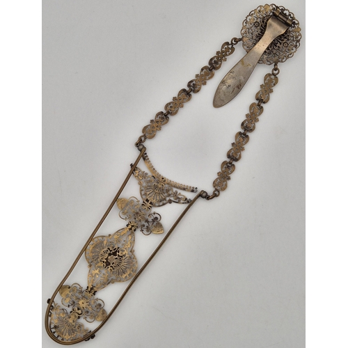 1759 - Victorian brass Chatelaine, with intricate detail. Length 24cm.