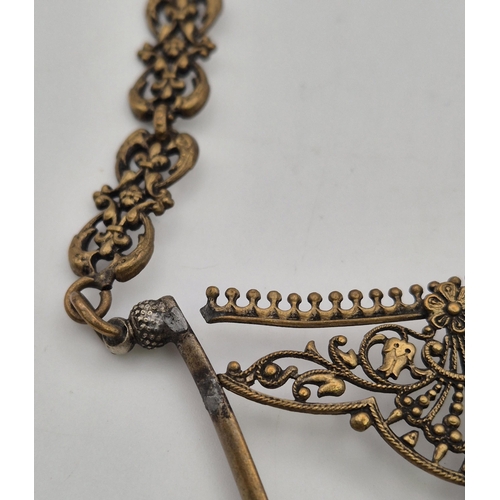 1759 - Victorian brass Chatelaine, with intricate detail. Length 24cm.