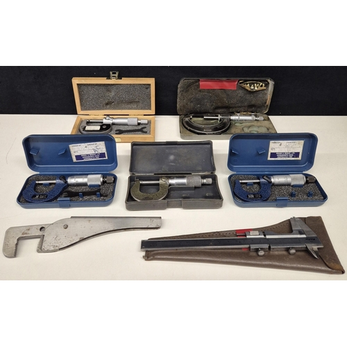 Collection of vintage engineer's tools. To include 5 boxed micrometers, caliper & footprint pipe wrench.