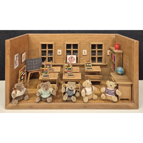 Three miniature Steiff bears, together with a Teddy bear School playset. Bear height approx. 8cm, school set H28, W54, D27.