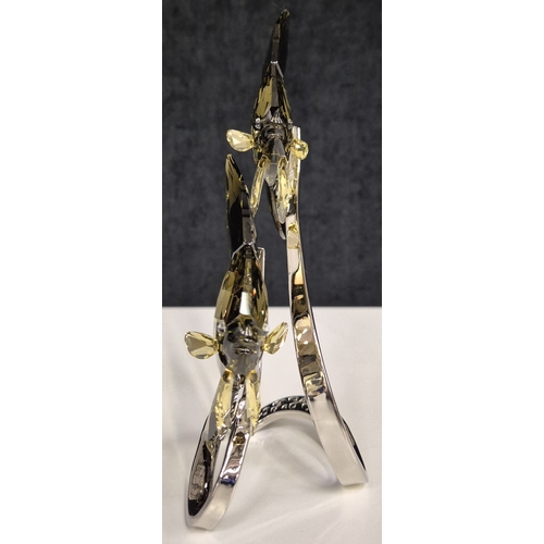 7008 - Swarovski model no: 1036571 - Smoky Batfish Pair

This serene pair of elegant Swarovski Batfish seem... 